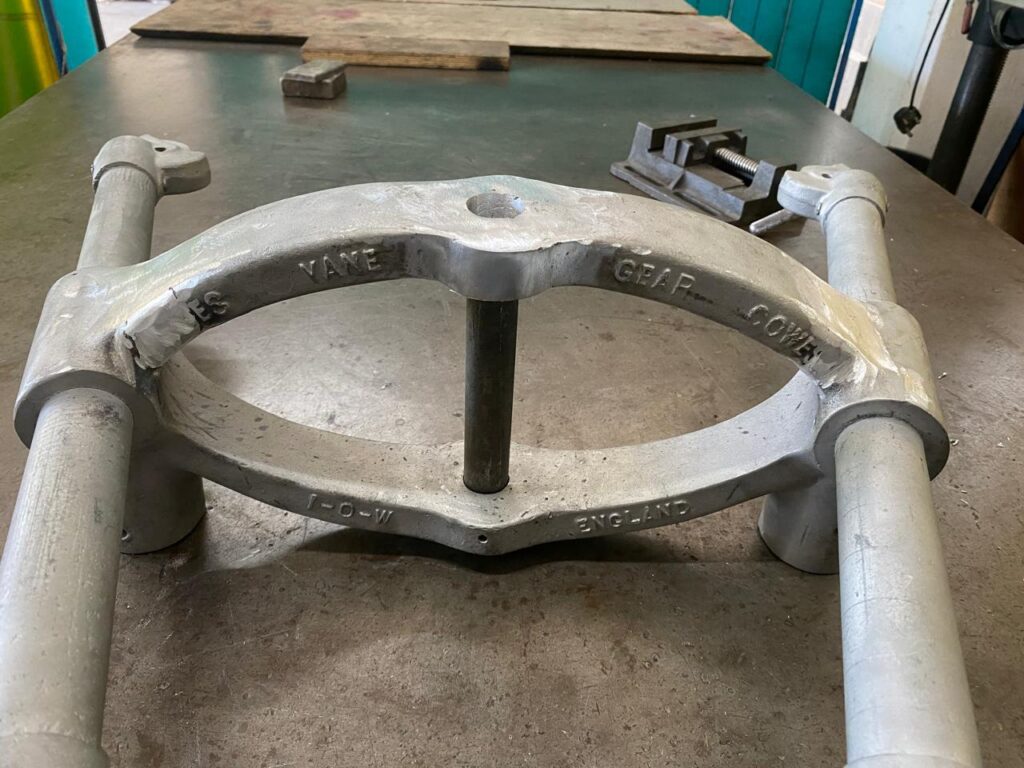 Cast aluminium suspension component after weld repair.